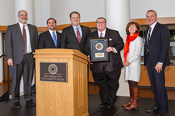 From left, John McArthur, Cameron University president, Don Betz, UCO president, Glen D. Johnson, Okla. State Regents chancellor, Natalie Shirley, OSU-OKC president and Paul Sechrist, OCCC president, present Representative Jon Echols (center) the 2014-15 Distinguished Service Award.