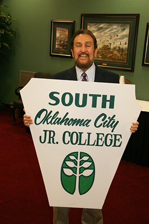 David PuentÃ© holds original vintage OCCC sign