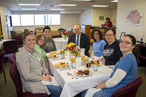 President Steward shares a celebratory breakfast with the CDCLS teachers. 