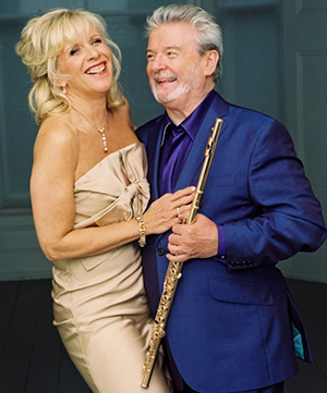 Sir James and Lady Galway with a flute