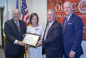 OCCC President Jerry Steward and OCCC Board of Regents Chair Devery Youngblood recognize representatives from the Presbyterian Health Foundation. 