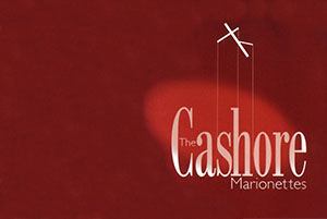 The Cashore Marionettes logo on red curtain 