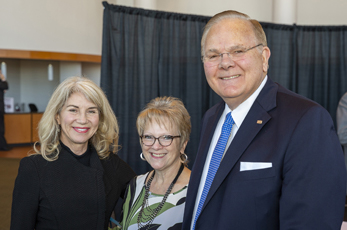 Sue Ann Arnall (left) poses with OCCC President Jerry Steward and his wife Tammy Steward during the announcement of a $200,000 grant to help OCCC students formerly in foster care.