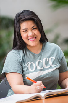 An OCCC student studying on campus. 