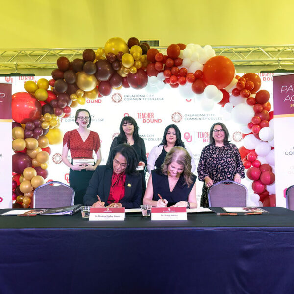 OCCC President Mautra Staley Jones and OU Dean of the Jeannine Rainbolt College of Education Stacy Reeder sign a partnership agreement to increase the number of teachers in Oklahoma.