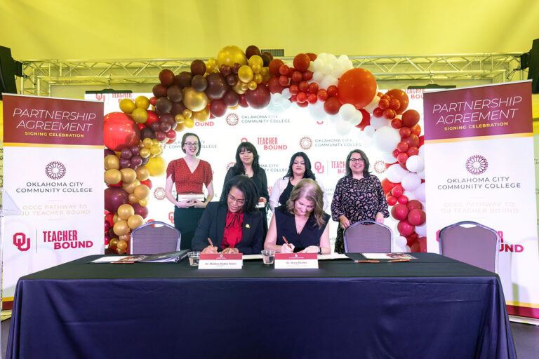 OCCC President Mautra Staley Jones and OU Dean of the Jeannine Rainbolt College of Education Stacy Reeder sign a partnership agreement to increase the number of teachers in Oklahoma.