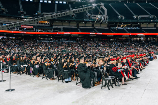 Dr. Mautra Staley Jones addressed more than 2,500 graduating students on March 2 at the University of Phoenix commencement in Phoenix, Arizona.